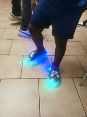 CHILDREN’S LIGHT-UP UNICORN FLIP-FLOP SANDALS